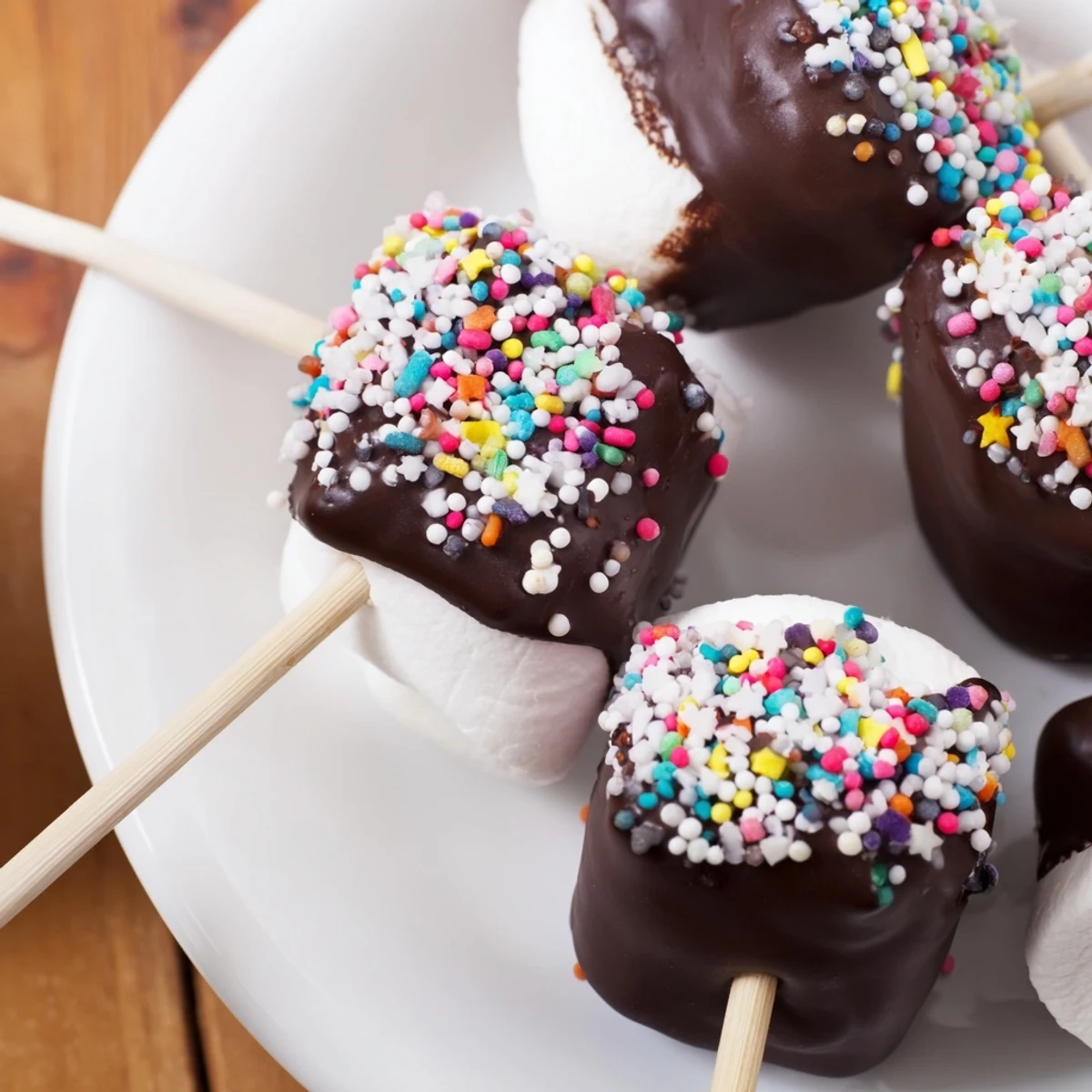 Chocolate Dipped Marshmallows with Sprinkles are easy to make and great for holiday gifting or snacking.