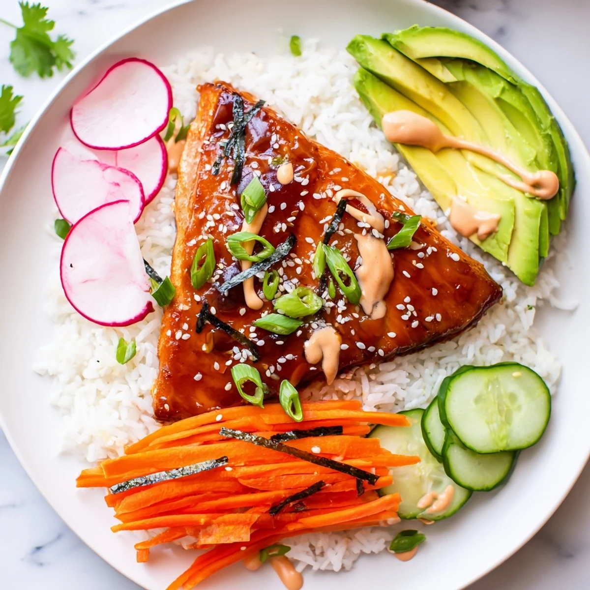 A close-up of Teriyaki Salmon Rice Taco Bowls with Pickled Veggies, featuring flaky glazed salmon over fluffy jasmine rice.