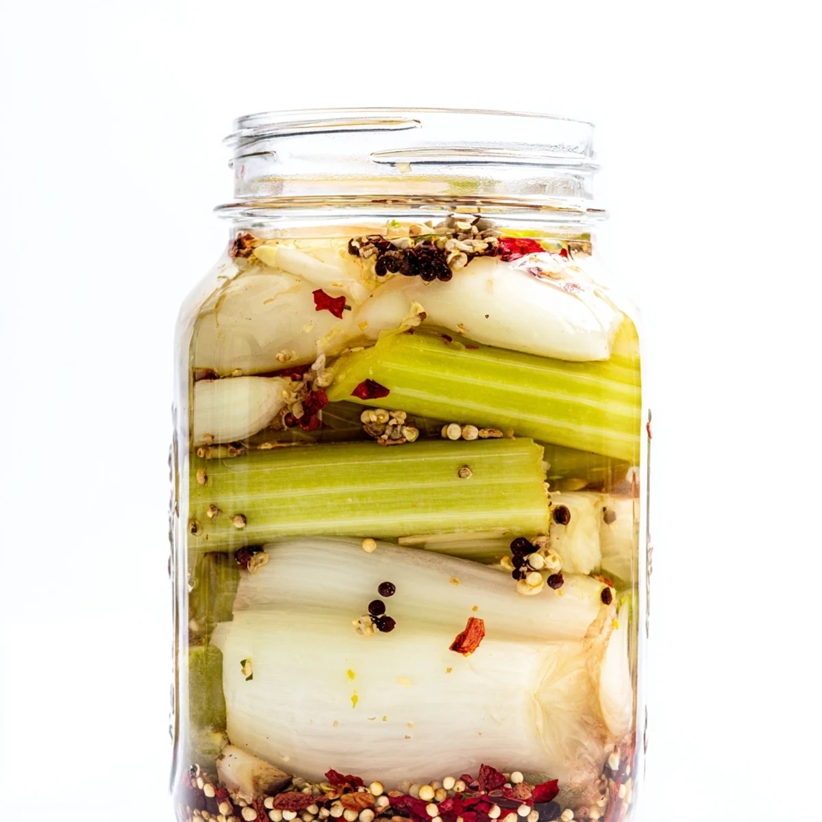 Quick Pickled Celery garnishes a fresh salad and adds crunchy tang to a savory deli sandwich.