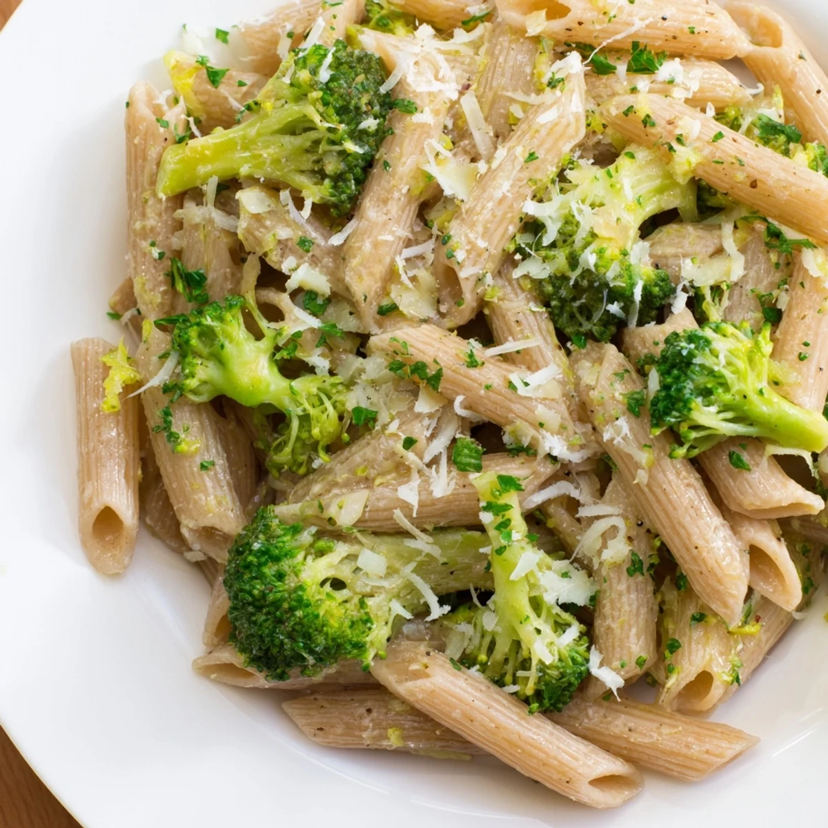 Vibrant green broccoli florets and whole wheat penne tossed in a light olive oil sauce.
