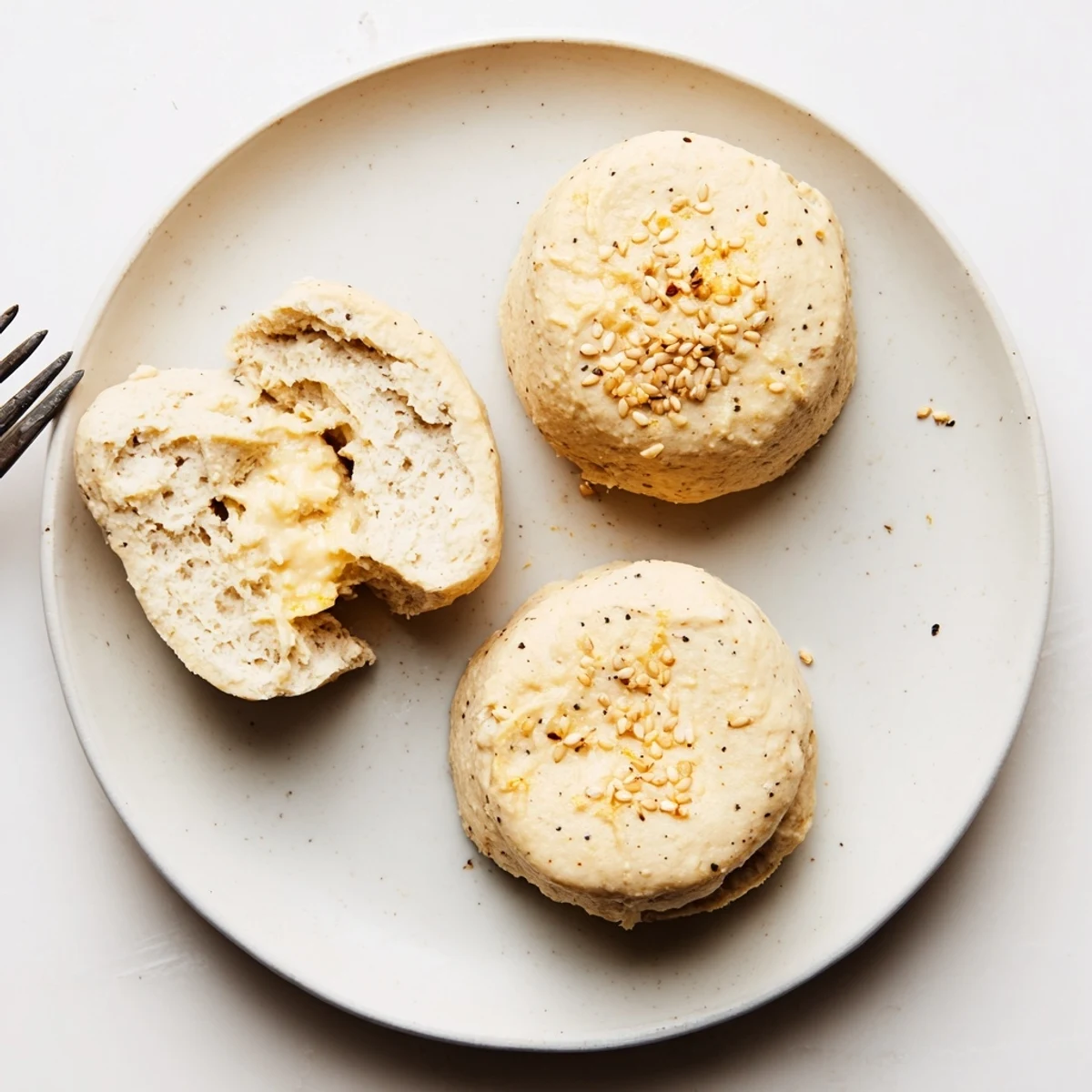 Tray of rustic Humous Scones with sesame seeds, ideal for brunch