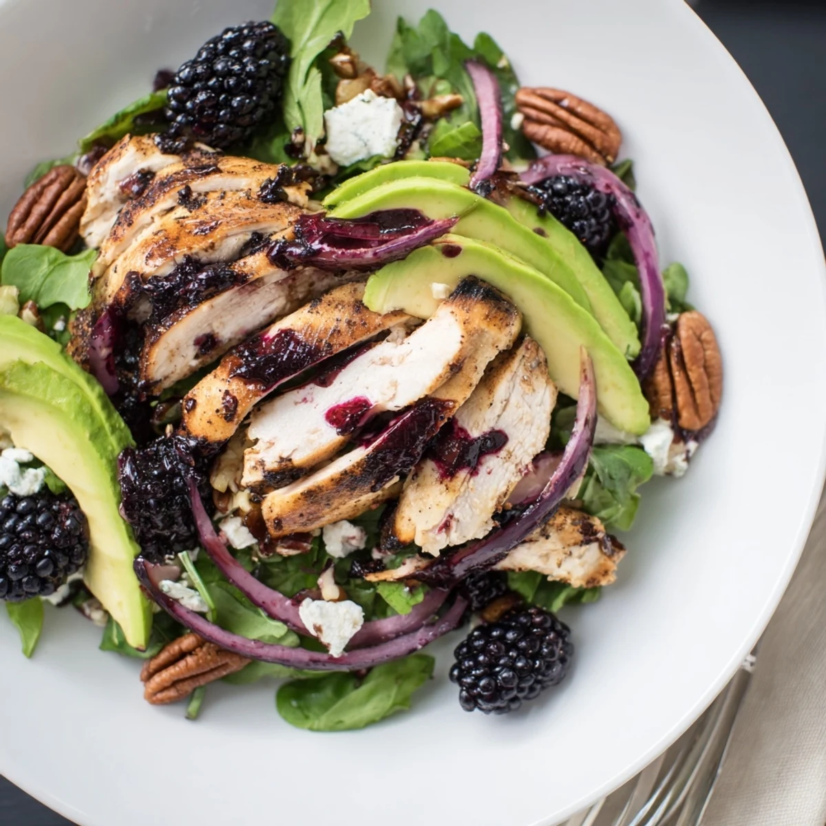 Bright Sweet Tangy Blackberry Chicken Salad drizzled with glossy blackberry vinaigrette, toasted pecans