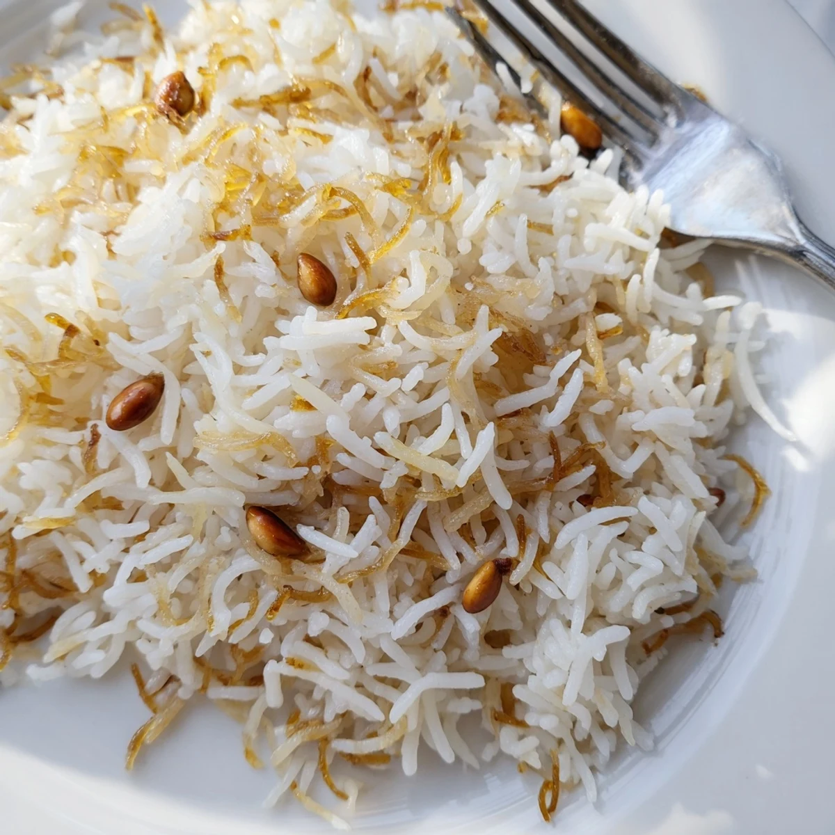 Fluffy Lebanese rice with golden toasted vermicelli served in a warm bowl